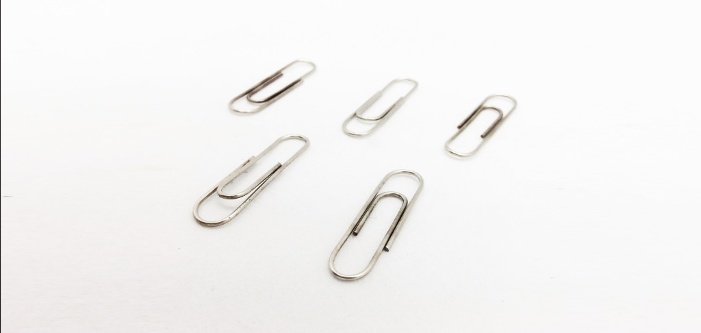 The Stainless Steel in Paper Clips acts as a catalyst and will help the Oxidation reaction go--especially with difficult Silver pieces.