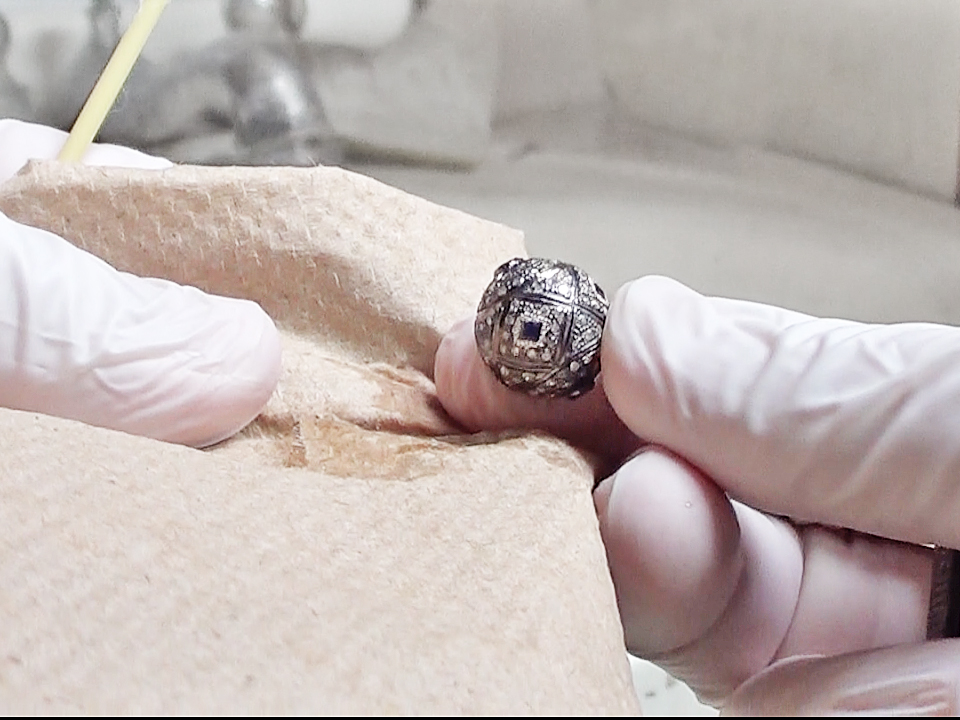 You can scrub small areas with a paper towel to even out the color if you don't have a polishing cloth handy.