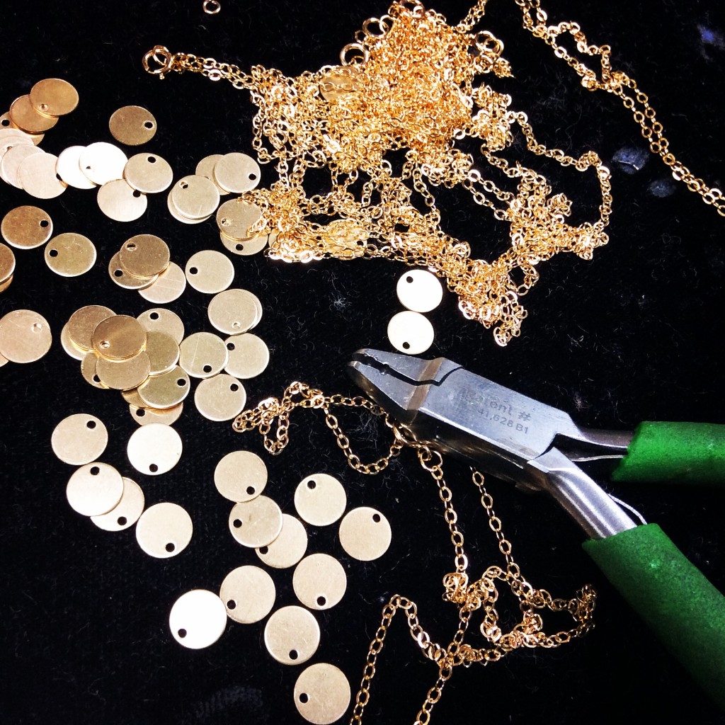 Gold Filled chains, blank tags, and a flat nose plier.